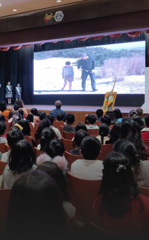 Children watching a curated global film at SCIFF